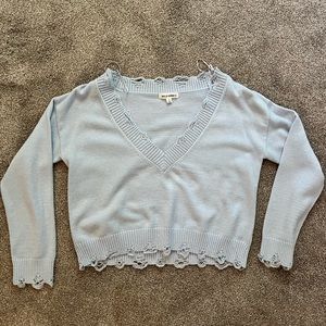 Light blue distressed sweater!